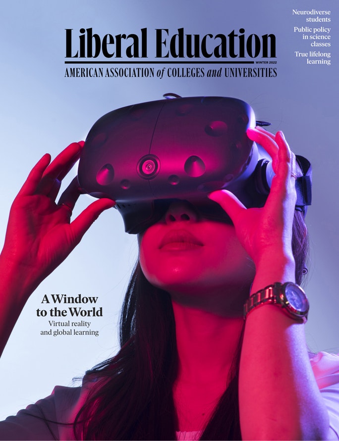 Photo on Liberal Education cover of film student at Georgia State University using a virtual reality headset.